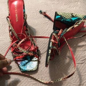 Red snake skin colored heels